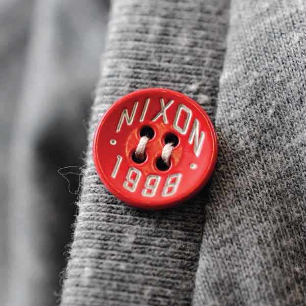 Nixon Red Plastic Button